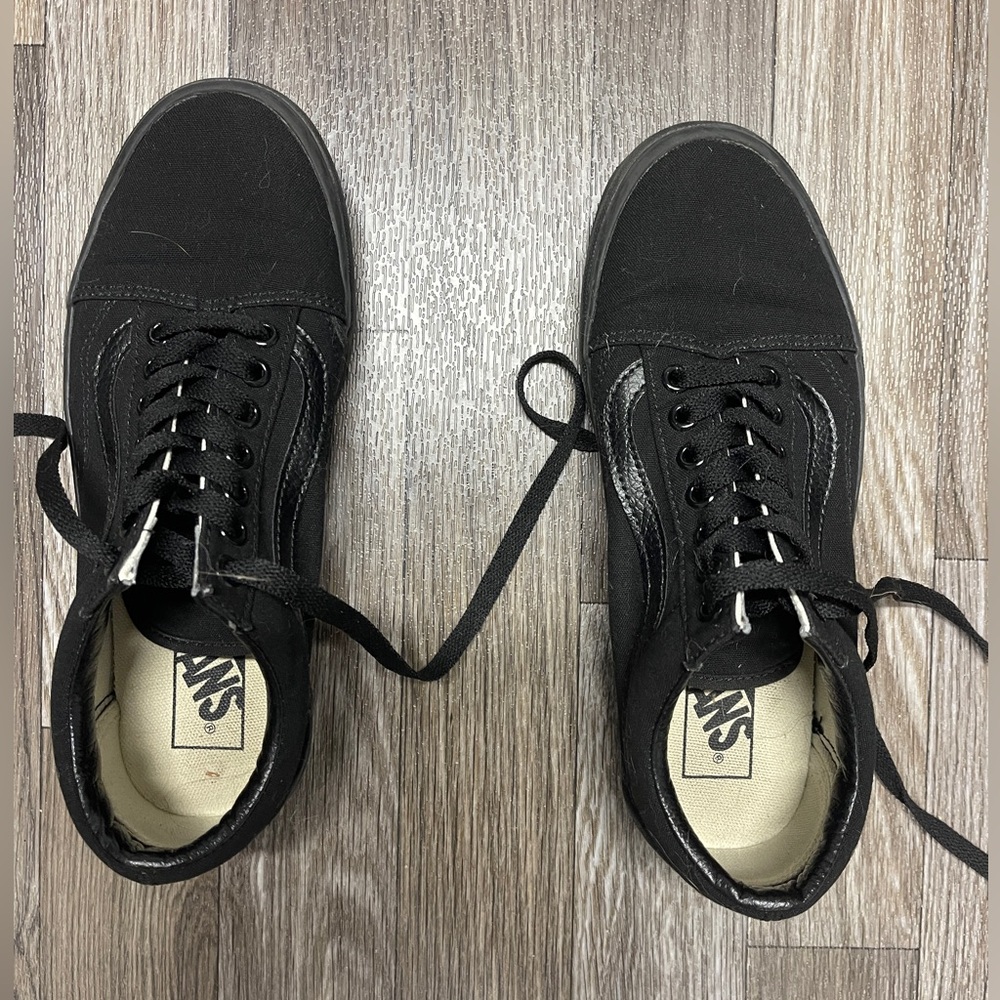 Vans all black classic skate shoe.